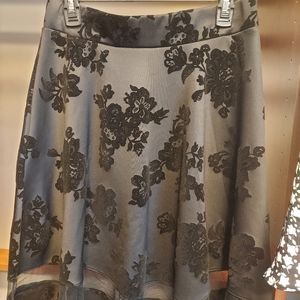 Black Peek-a-boo skirt with Flower Motif